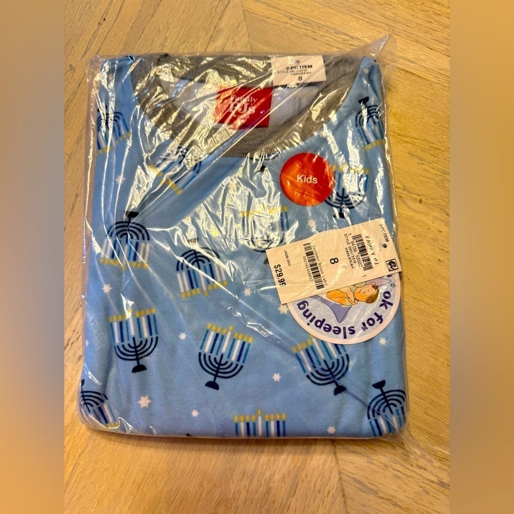Brand new in package Kids Unisex Hanukkah Menorah Pajamas from Macy’s. Size 8.